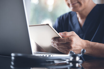 EHR RFP and template - man with laptop