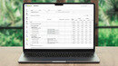 a laptop displaying an ICANotes+ Reports aging-by-service-date screen for a behavioral health practice